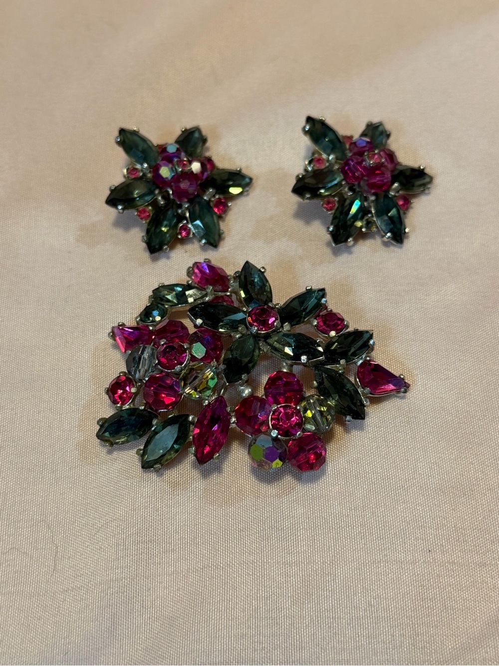 Vintage signed Schiaparelli Rhinestone Brooch and matching Clip On Earrings.